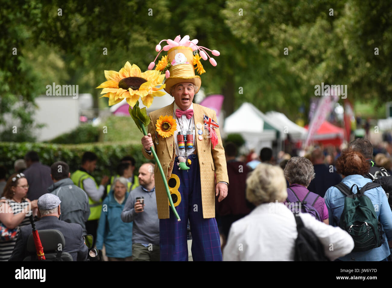 Shropshire, UK. 11th August, 2017. A floral welcome from Professor Crump alias Paul Goddard at the annual Shrewsbury Flower Show in Shropshire. The two day event is open today and Saturday. Credit: David Bagnall/Alamy Live News Stock Photo