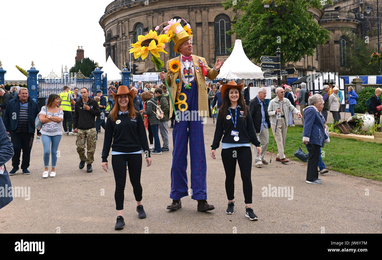 Shropshire, UK. 11th August, 2017. A floral welcome from Professor Crump alias Paul Goddard at the annual Shrewsbury Flower Show in Shropshire. The two day event is open today and Saturday. Credit: David Bagnall/Alamy Live News Stock Photo