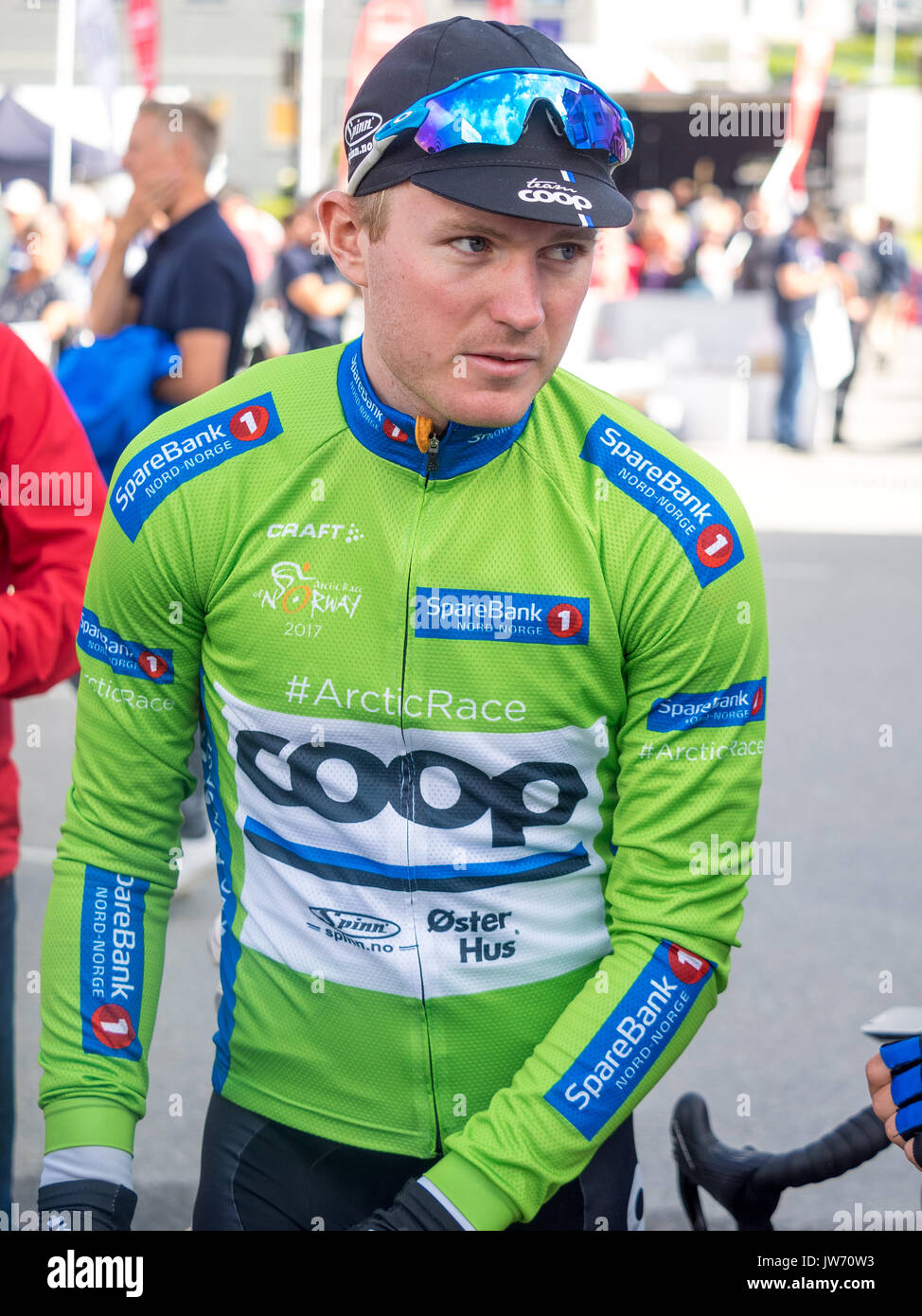 The norwegian cyclist August Jensen preparing for the second stage og Arctic Race of Norway in Sjoevegan in Northern Norway Stock Photo