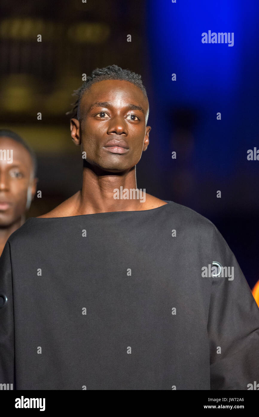 London, UK, 11th August 2017. The Ibrahim Musa collection is presented. Models on the first runway of the day, with designs by Adesegun George, Ibrahim Musa, De-Beauharnais Mabhun,u Grey On Gray, Naadoley, Purpose. Since debuting in 2011, the two day Africa Fashion Week London, AFWL, has grown into one of the largest African and Africa-inspired fashion events in Europe. Credit: Imageplotter News and Sports/Alamy Live News Stock Photo