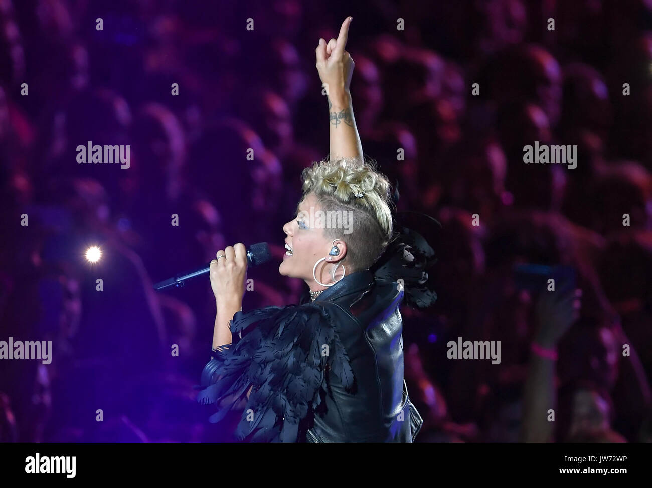 Singer pink performs live on stage hi-res stock photography and images ...