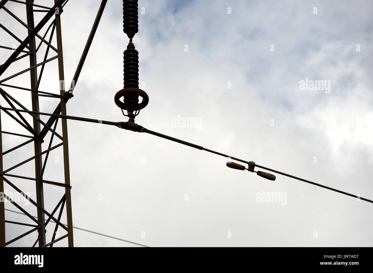 High Voltage line with isolators, and a vibration surpresser. Stock Photo