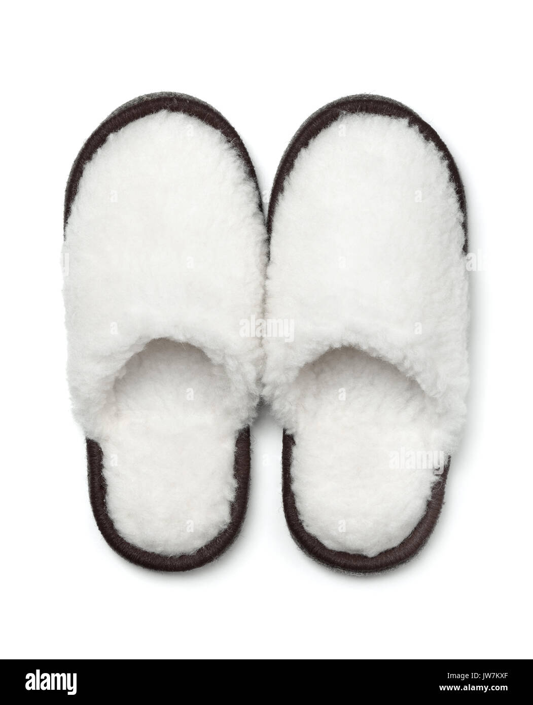 Pair of soft fur slippers isolated on white Stock Photo