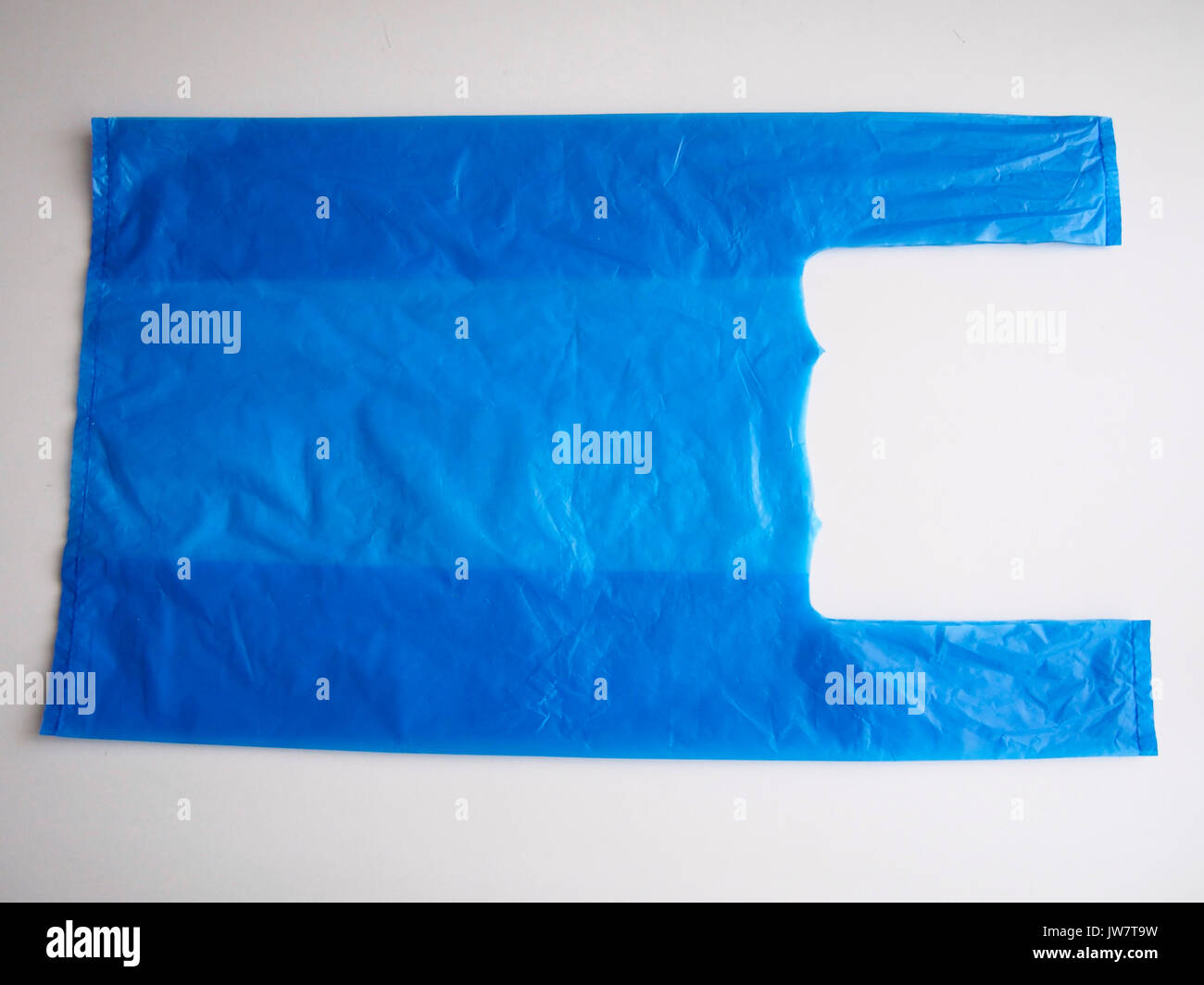 Blue plastic bag on white background Stock Photo Alamy