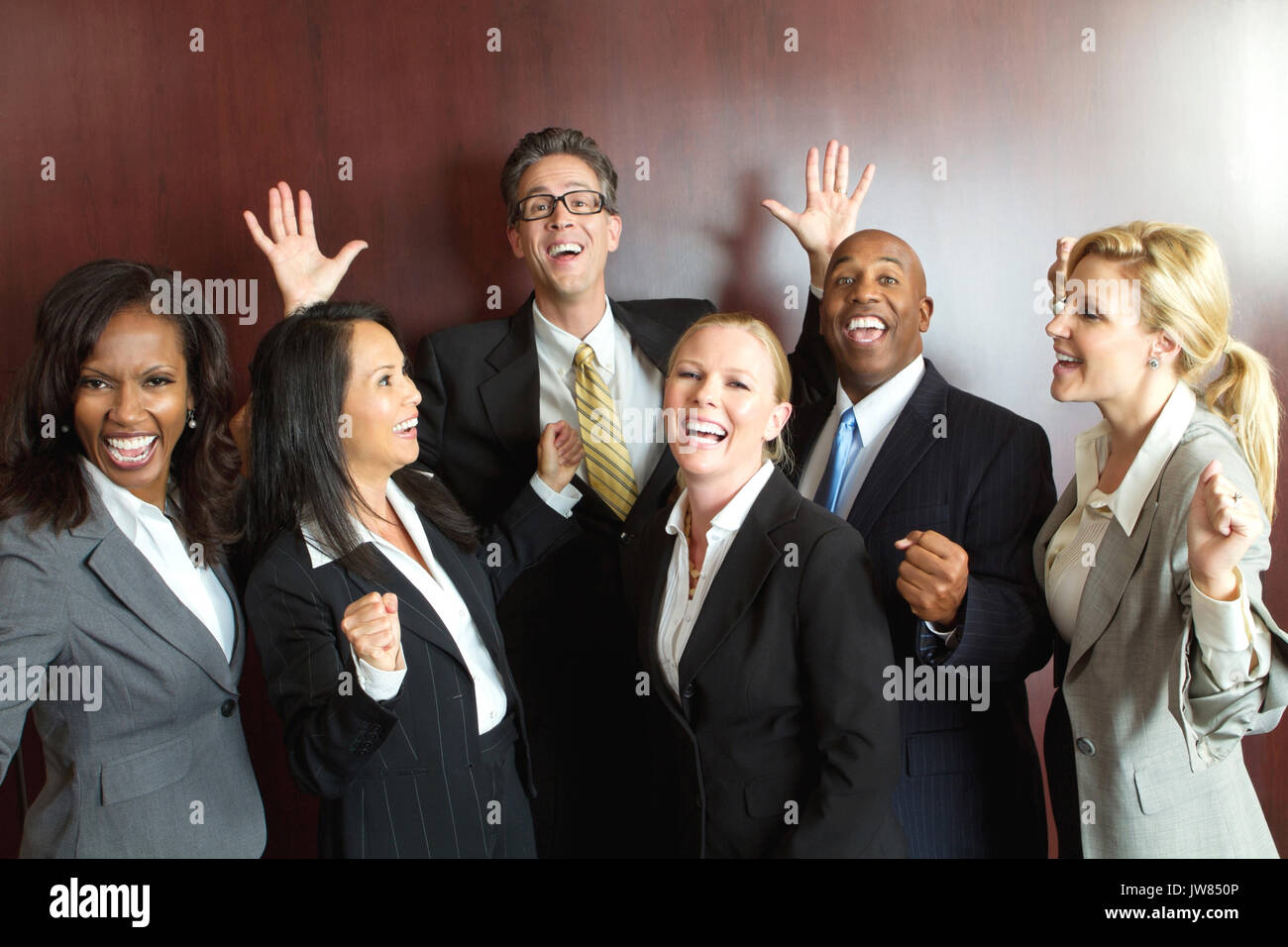 Excited diverse group of business people Stock Photo - Alamy