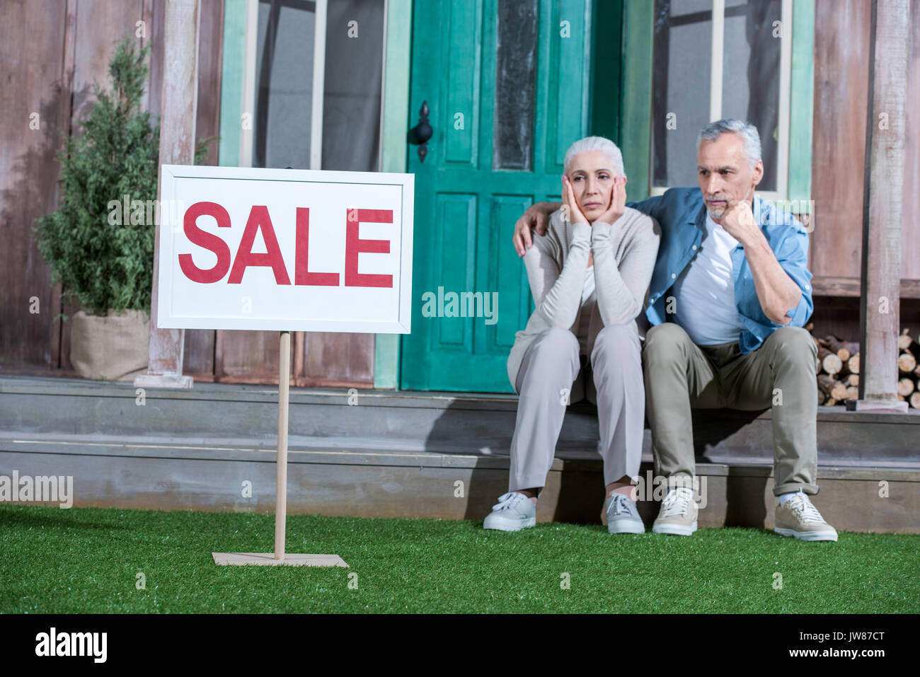 Couple sitting on porch hi-res stock photography and images - Alamy