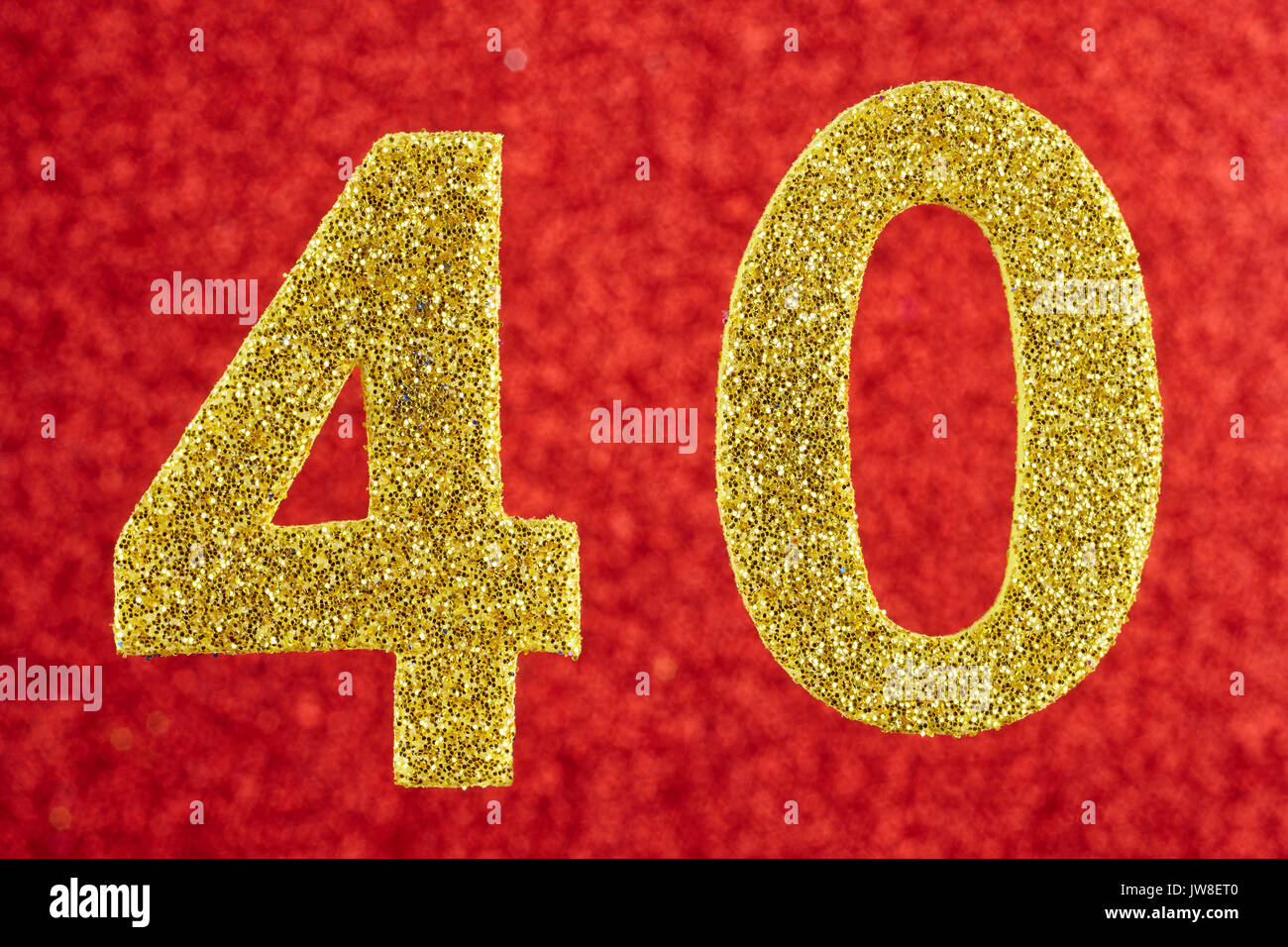 Number forty yellow color over a red background Anniversary