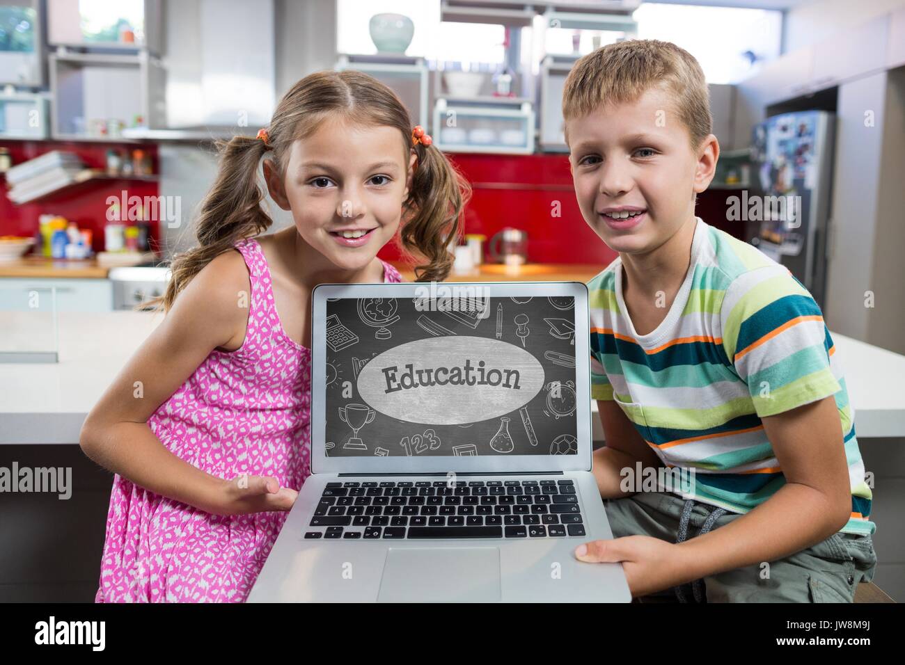 Digital composite of Kids looking at a computer with school icons on ...