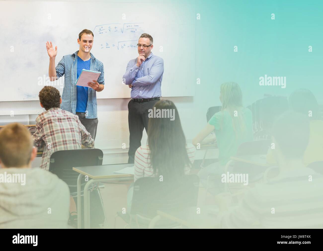 Digital composite of Teacher with class Stock Photo