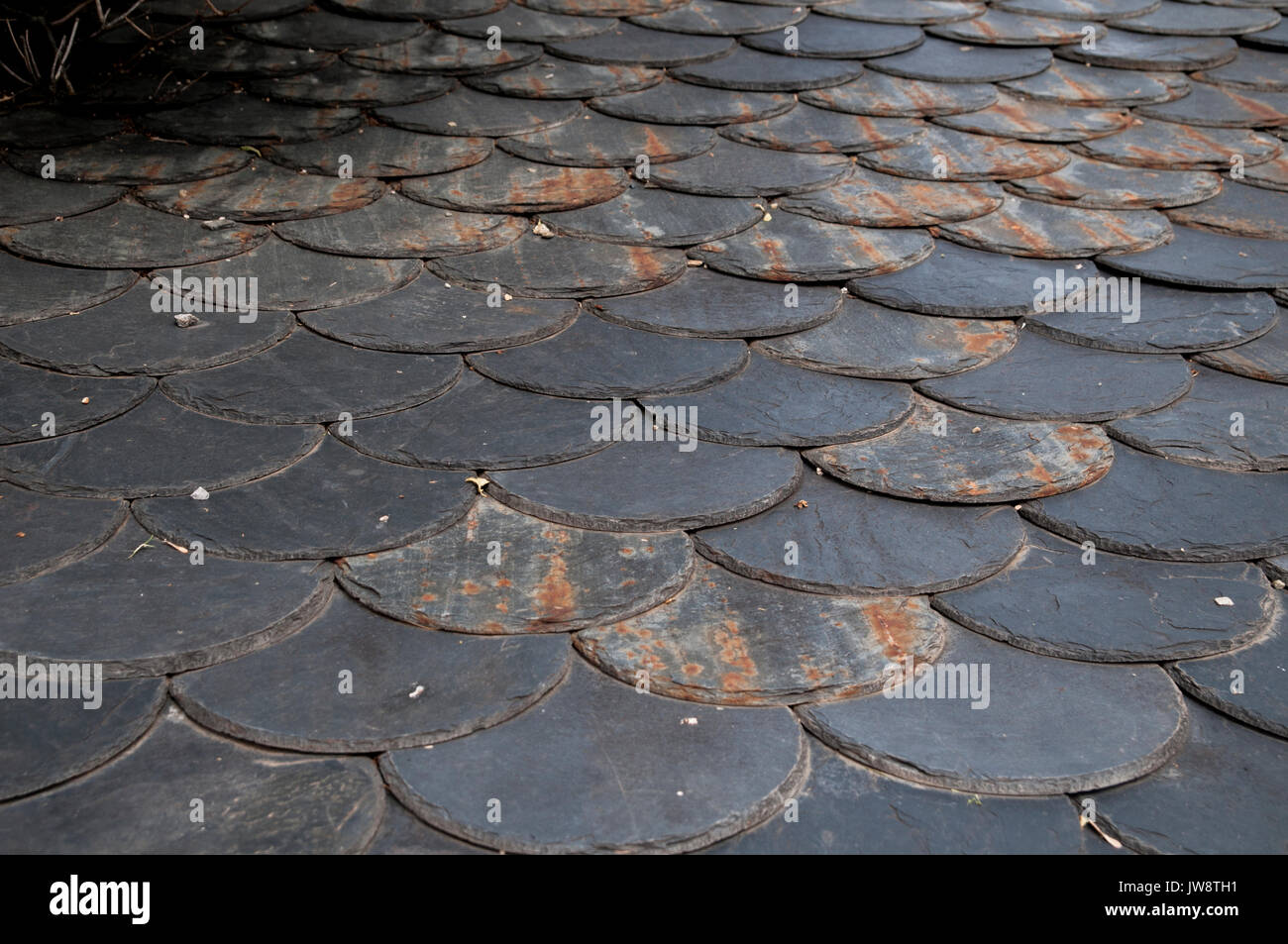 Natural stone shingles used for roofing. Photographed in  Son, Province of Lleida, Catalonia, Spain Stock Photo