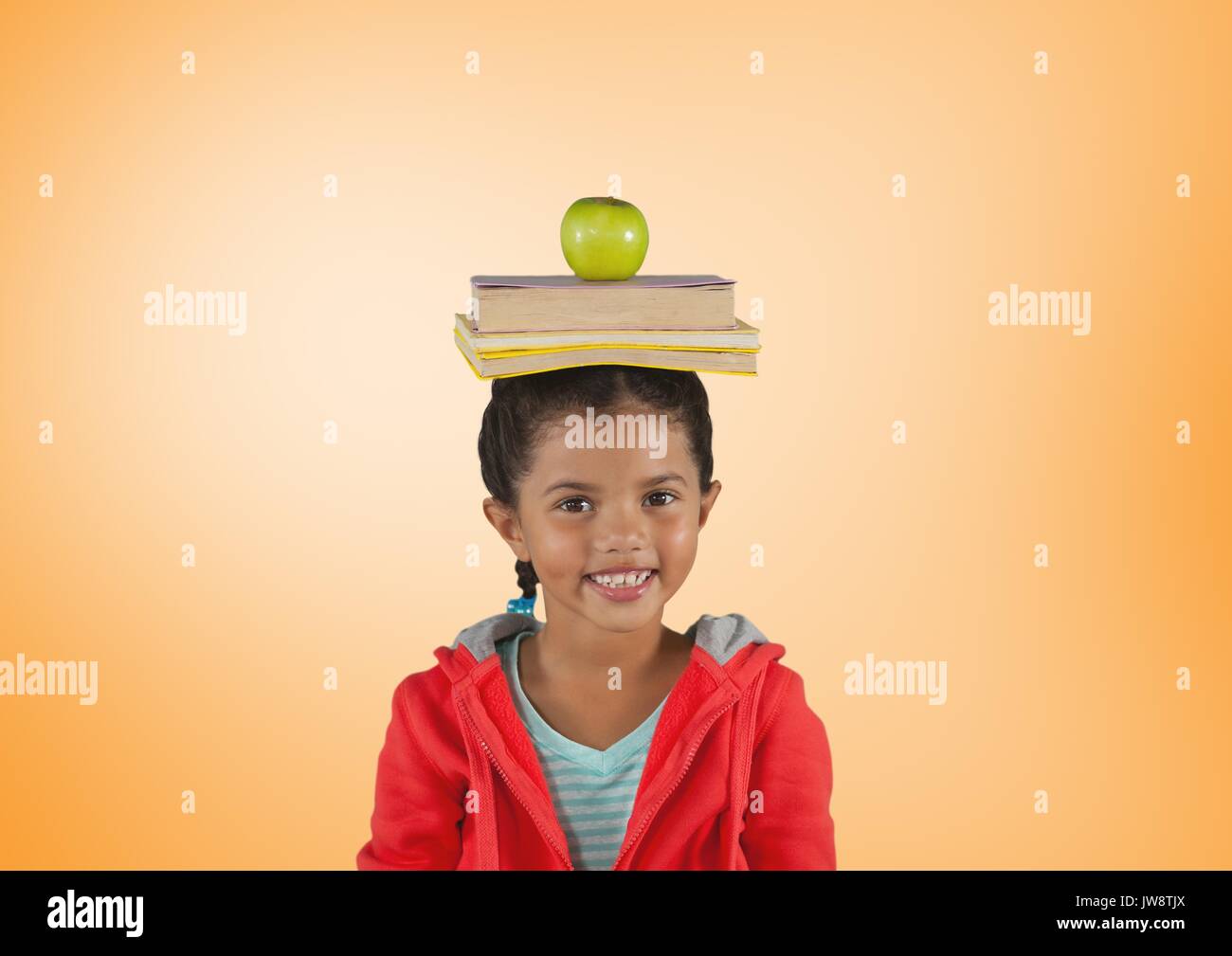 Digital composite of Girl with books and apple on head in front of ...