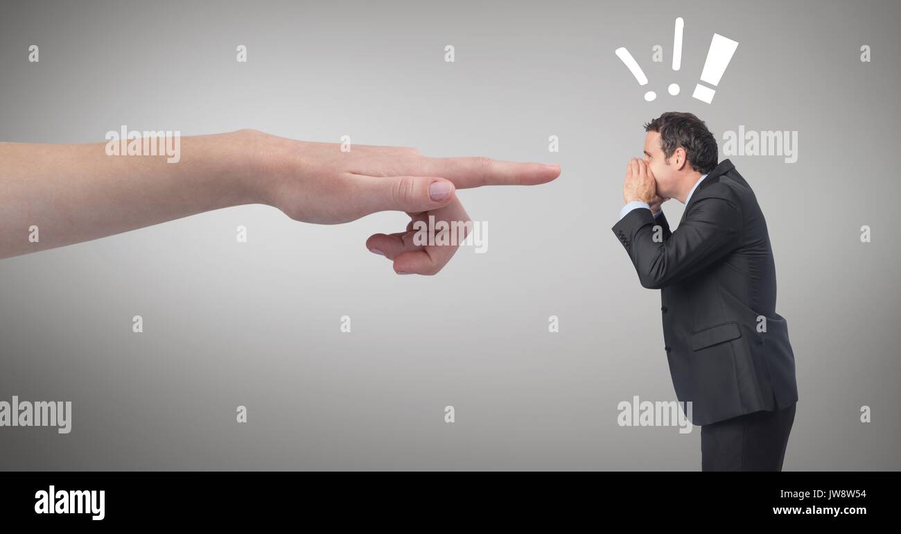 Digital composite of Hand pointing at angry business man against grey ...