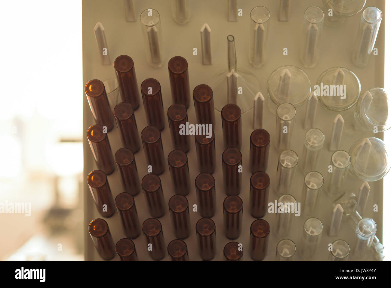 Close up of text tubes in rack at science lab Stock Photo - Alamy