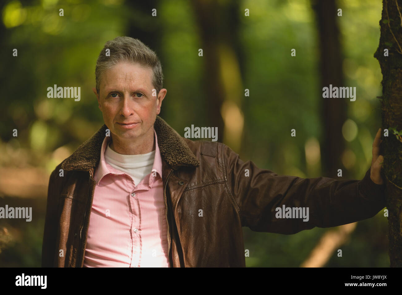 Man standing in a forest hi-res stock photography and images - Alamy