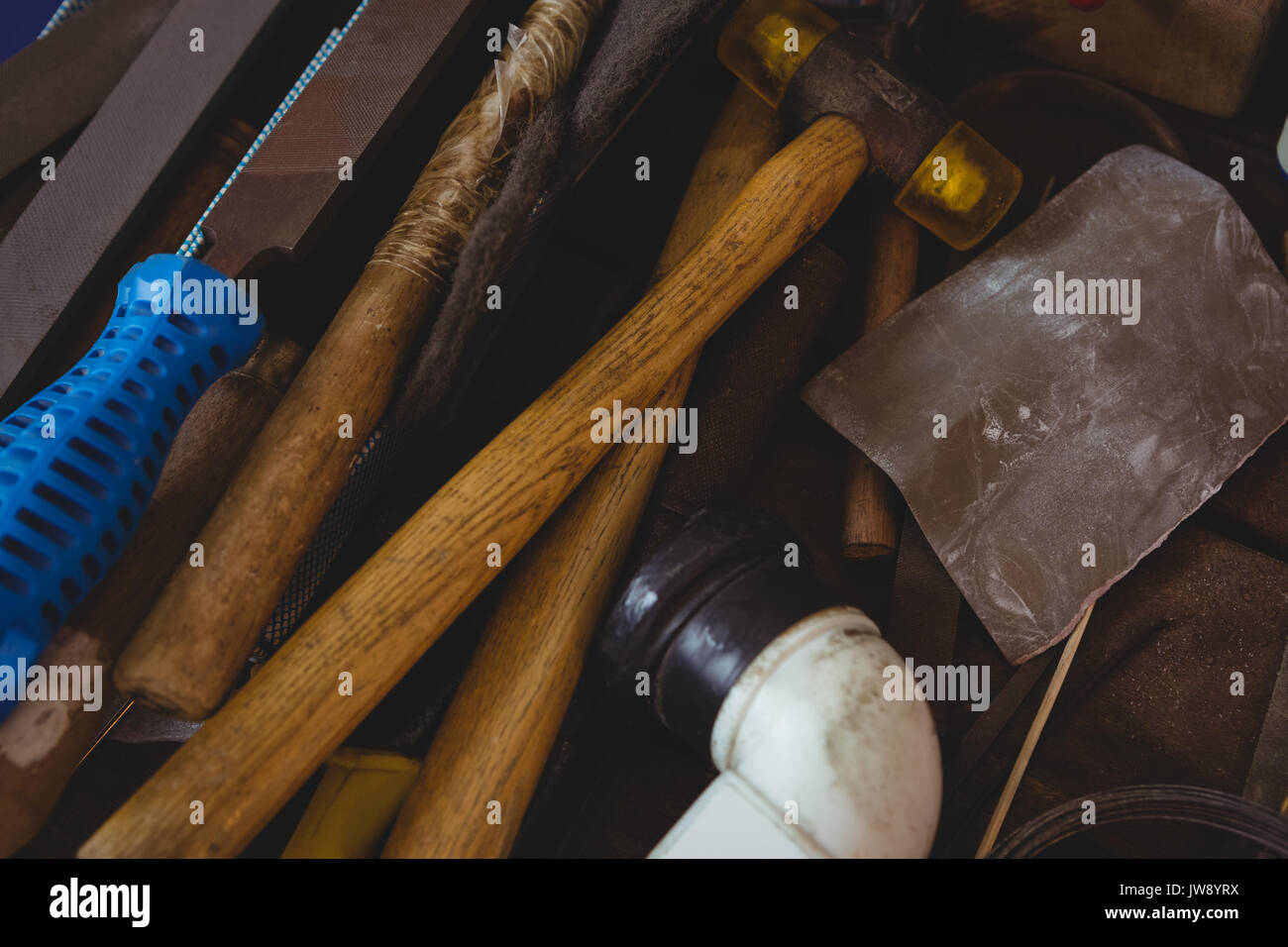 Various tools on worktop in workshop Stock Photo
