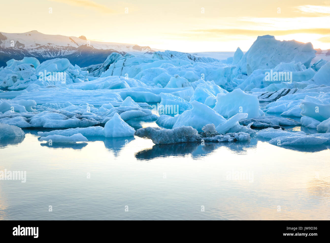 Beautiful view of icebergs in Jokulsarlon glacier lagoon at sunset ...