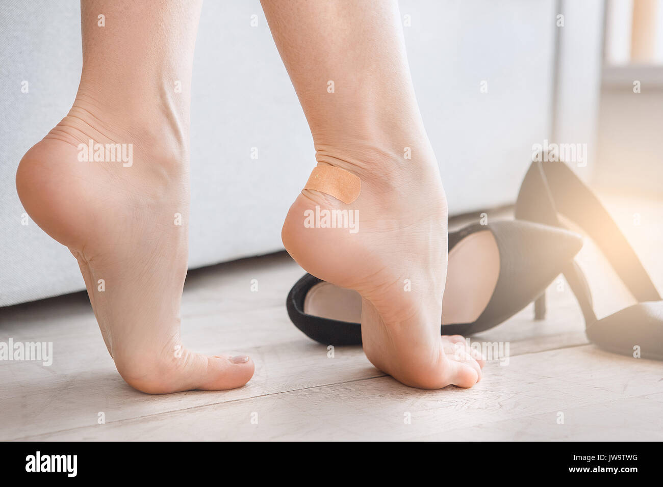 Young female body care at home rub feet Stock Photo Alamy