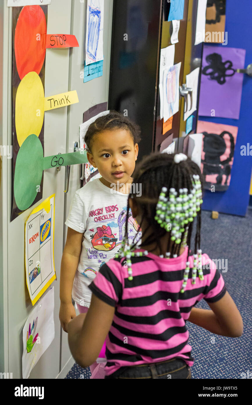 Charlotte, North Carolina - Children in Head Start at the Bethlehem Center use a conflict resolution procedure called 'Stop, Think, Go.' The Center se Stock Photo