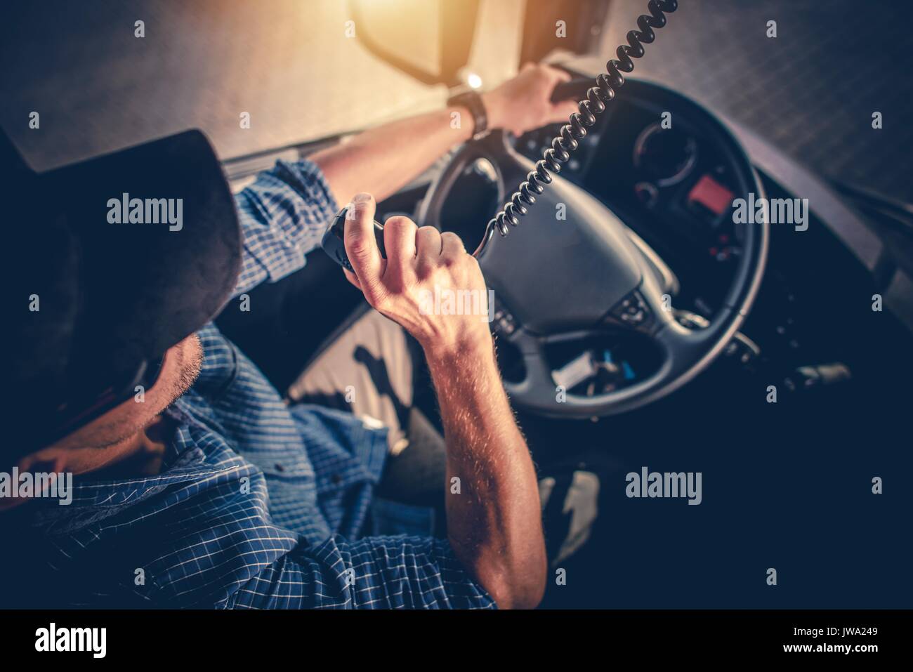 Semi Truck Driver Making Conversation with Other Truck Drivers Through