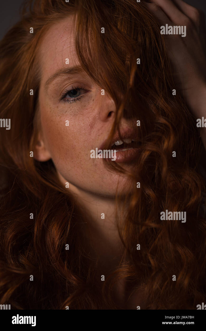 sensual portrait of a redheaded beautiful woman Stock Photo - Alamy