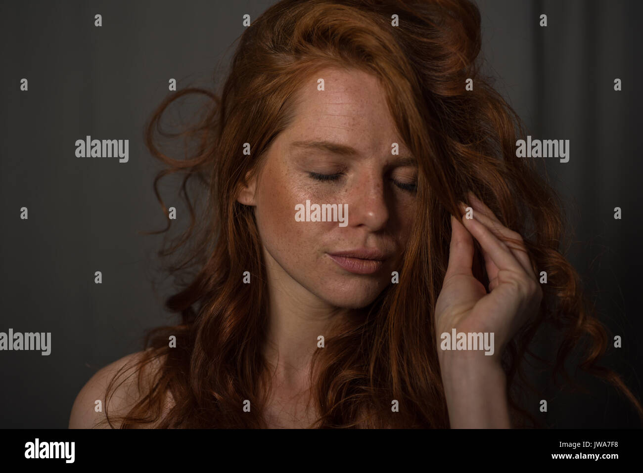sensual portrait of a redheaded beautiful woman Stock Photo - Alamy