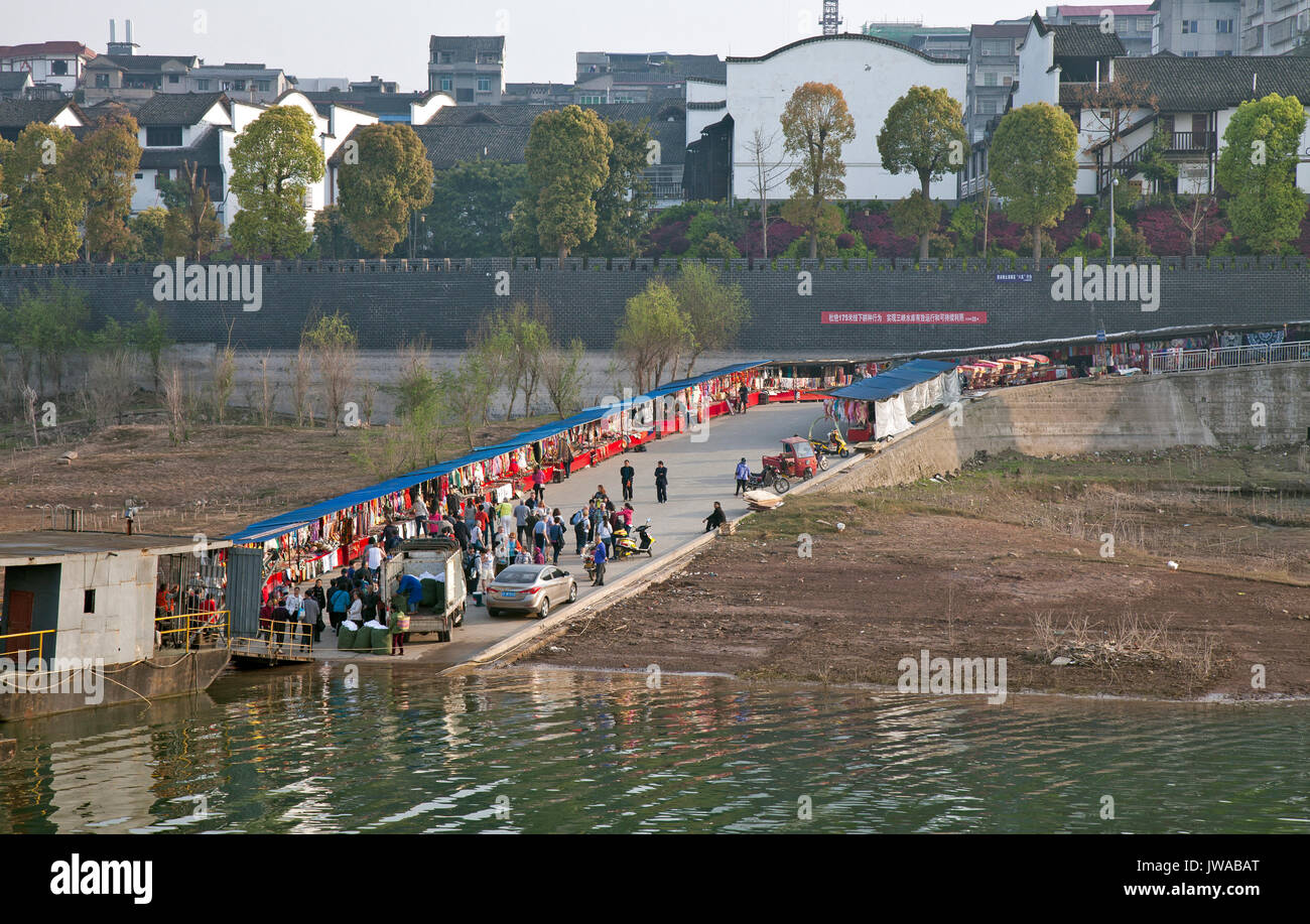 Yangtze River Cruise stops also include running the gauntlet of souvenir sellers. Stock Photo