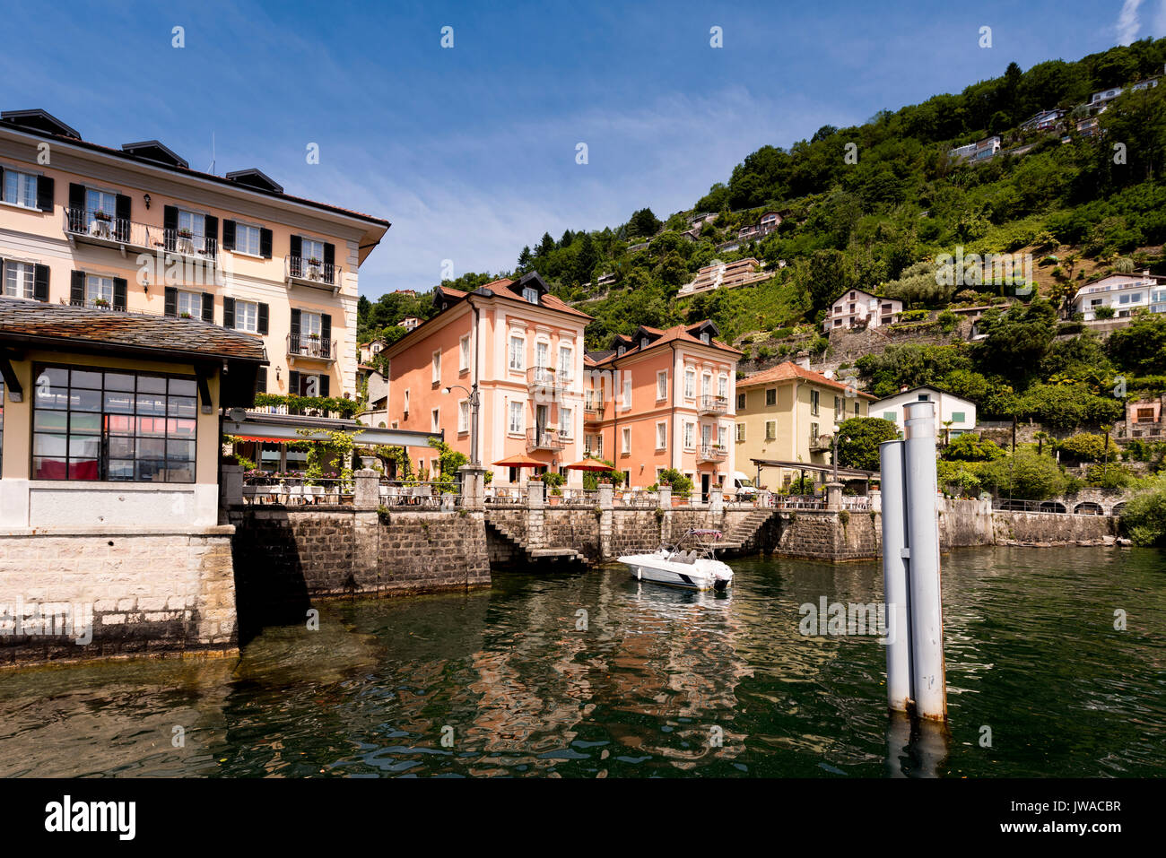 The pier and houses of Cannero Riviera - Cannero Riviera , Lake Maggiore, Lombardy, Italy, Europe Stock Photo