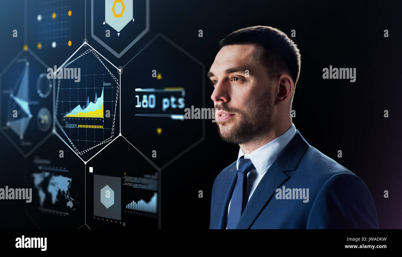 businessman with virtual screen over black Stock Photo