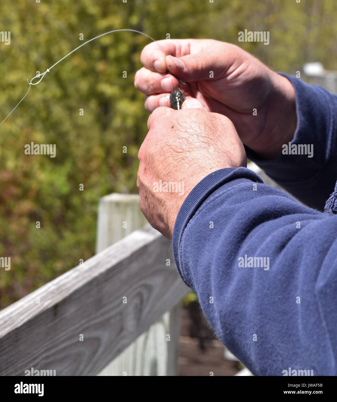 Baiting a hook hi-res stock photography and images - Alamy