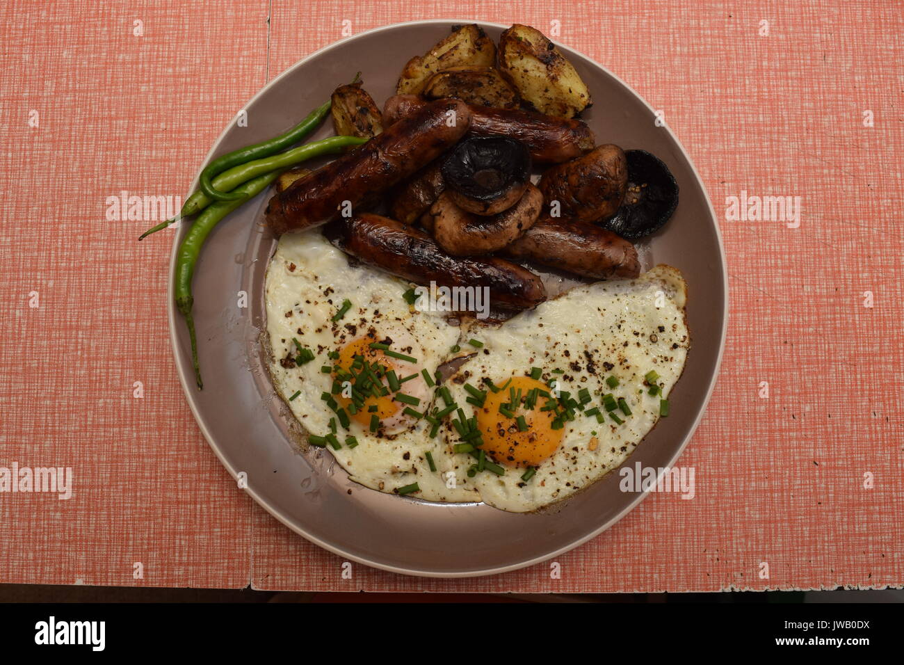 Full English breakfast served on a plate Stock Photo