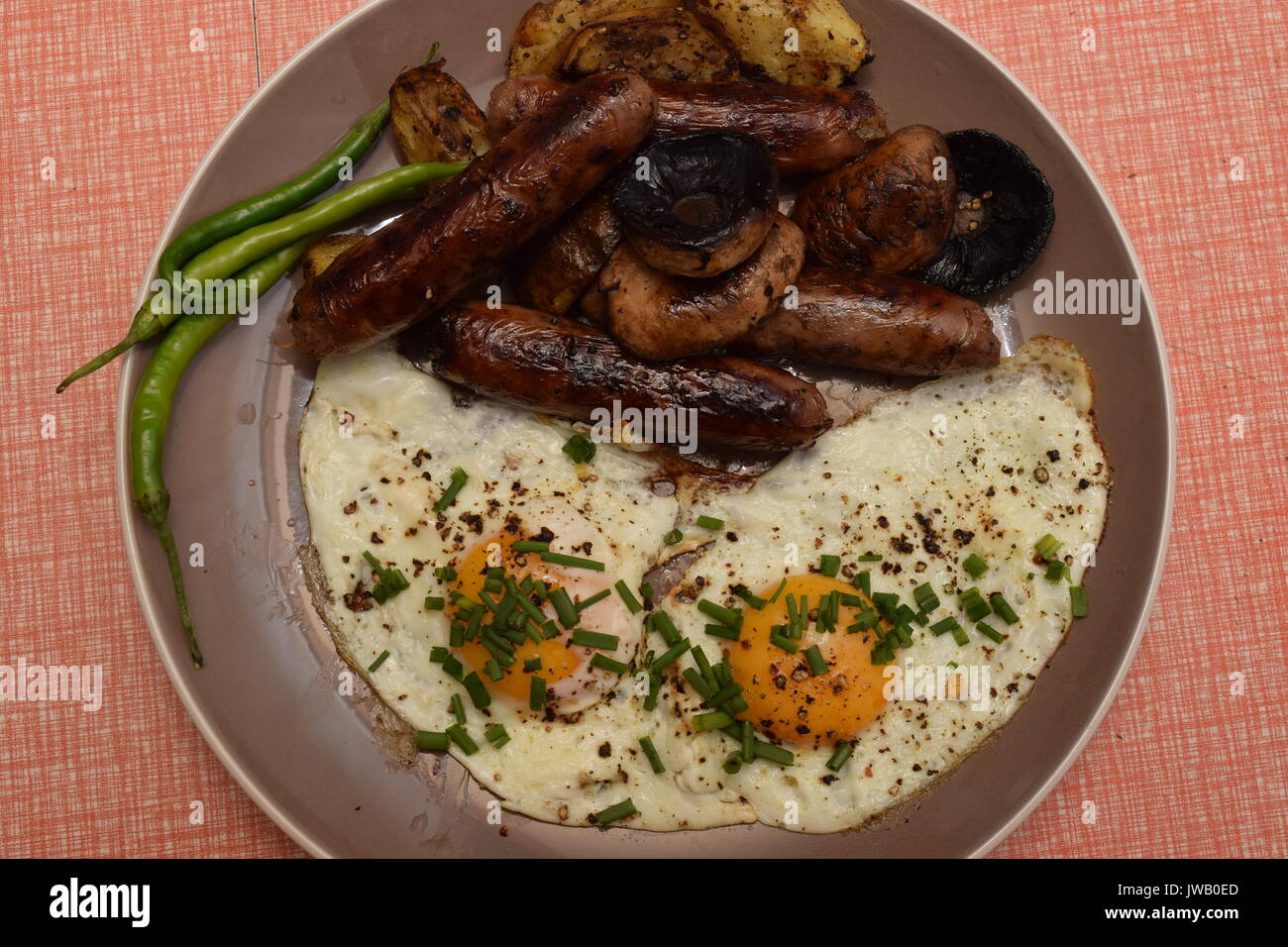 Full English breakfast served on a plate Stock Photo