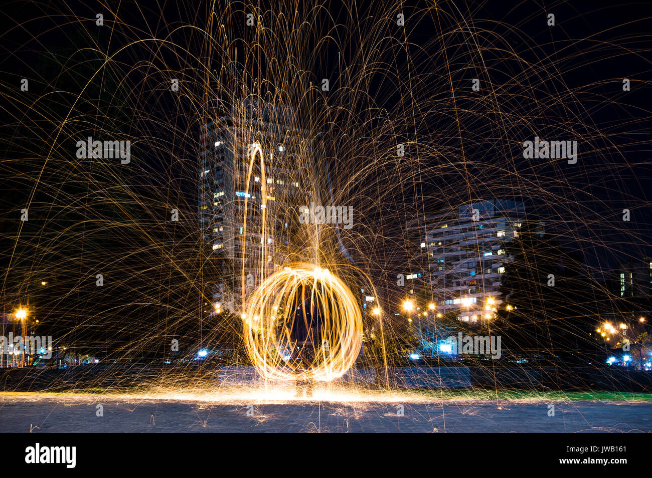 Steel wool light painting in Santiago, Chile Stock Photo