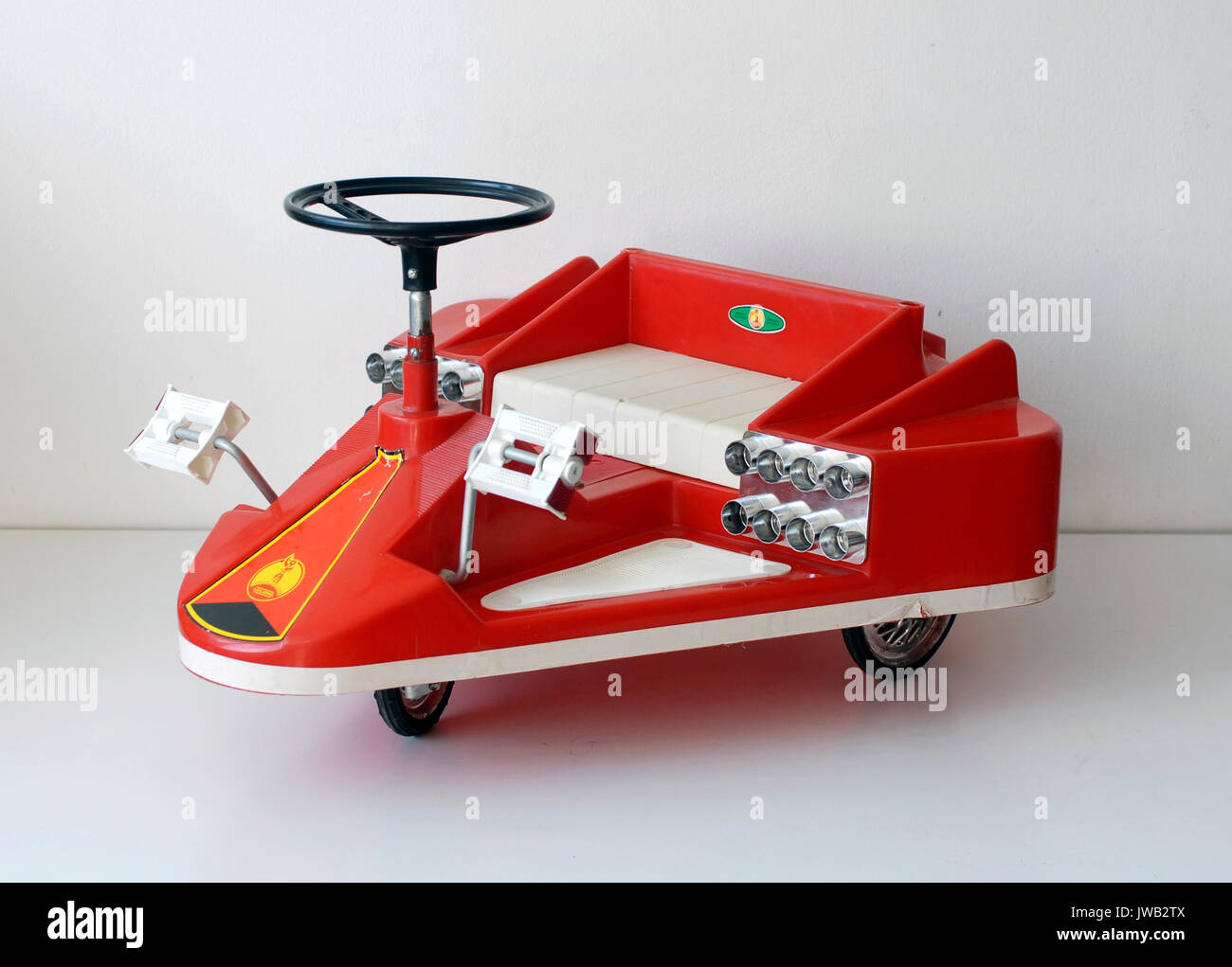 Vintage toy tricycle with spacecraft shape. Coloma, manufactured in Barcelona, Made in Spain Stock Photo