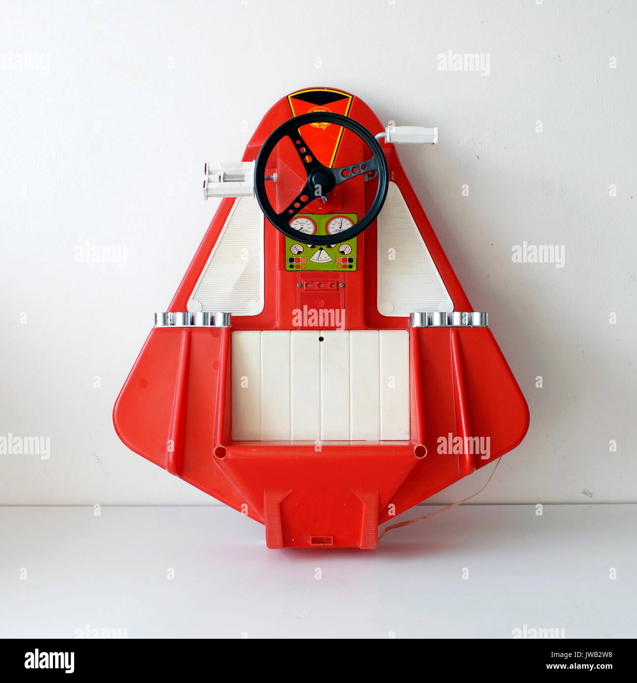 Vintage toy tricycle with spacecraft shape. Coloma, manufactured in