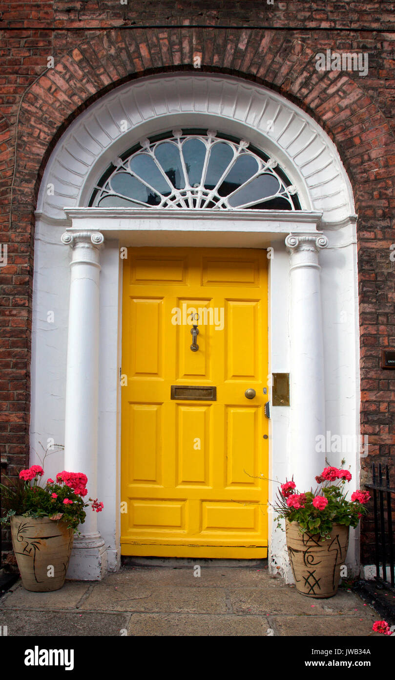 yellow door in Georgian Dublin Stock Photo