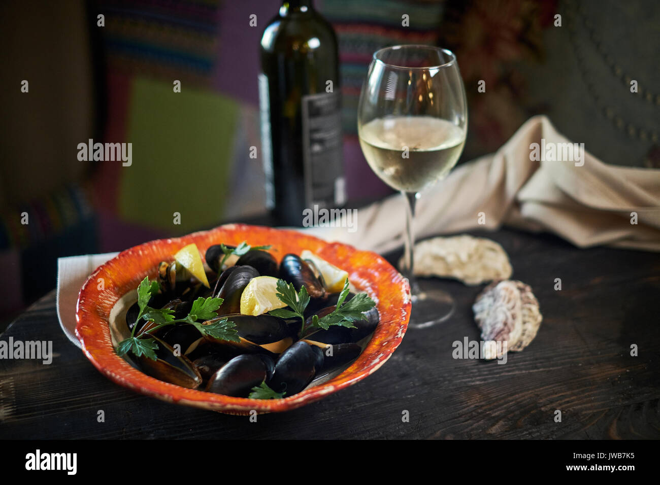 Mussels on ice ready to cook with lemon and white wine jpg Stock Photo