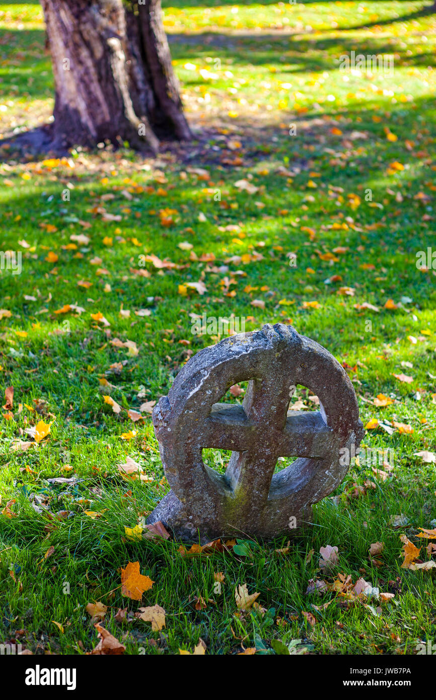 Ancient nordic people's sun cross in a cemetery Stock Photo