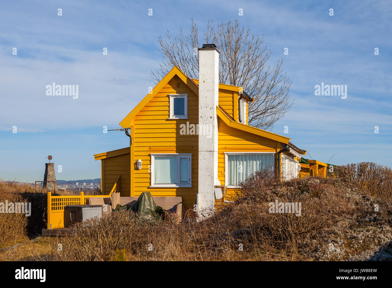 Yellow wooden cabin on the island, Norwegian style Stock Photo Alamy