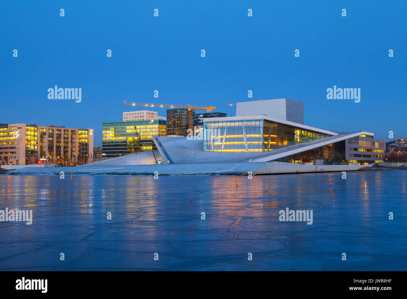 OSLO, NORWAY, FEBRUARY 28, 2016: Night view of the Opera House and new business quarter Stock Photo