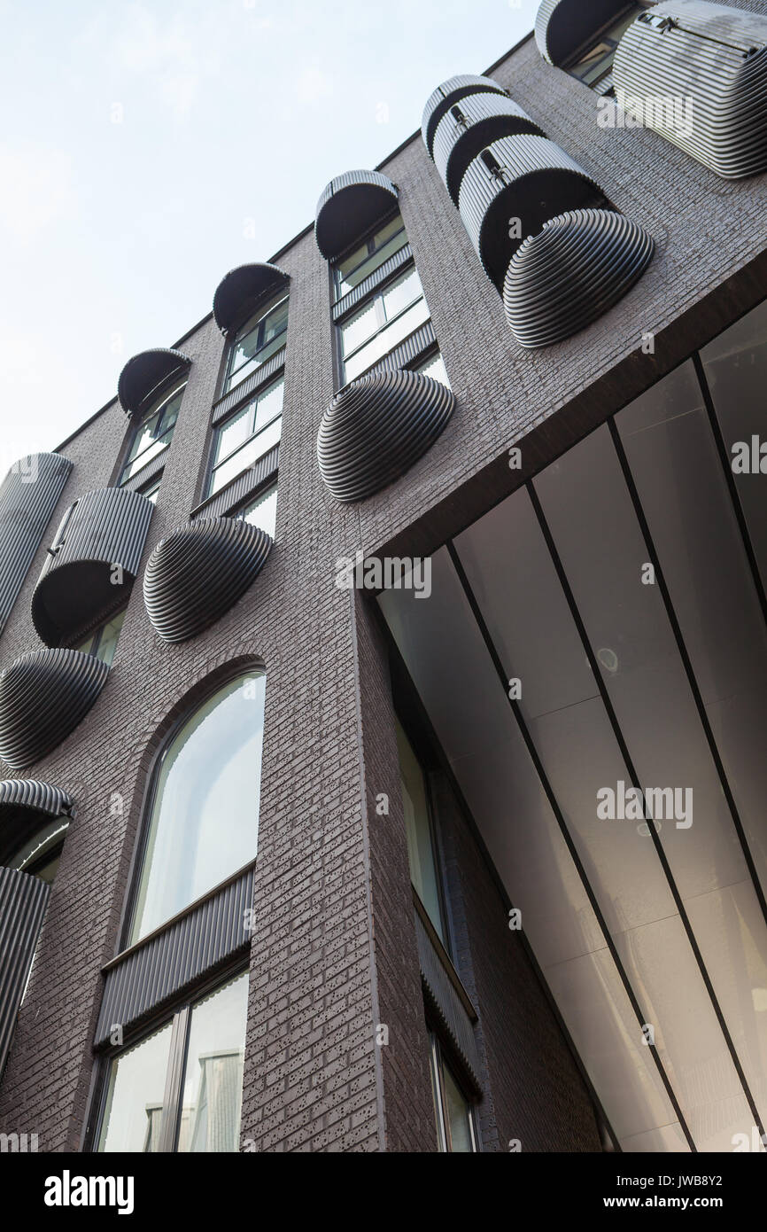 Ulltra modern dark grey brick business building with rich exterior