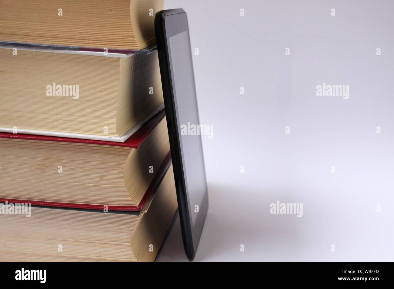 Books and tablet Stock Photo