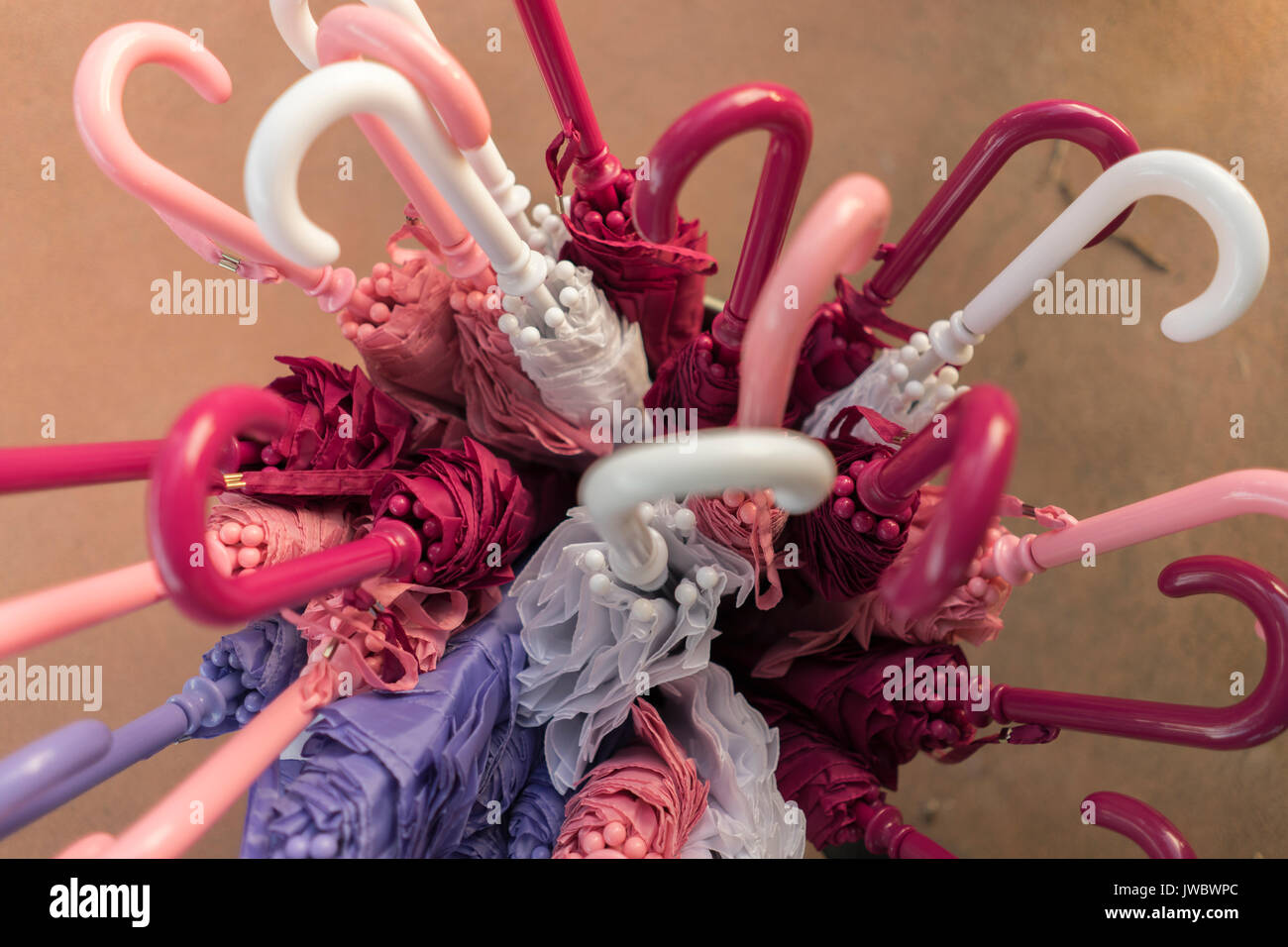 Red Purple And Blue Umbrellas In A Bunch Stock Photo Alamy