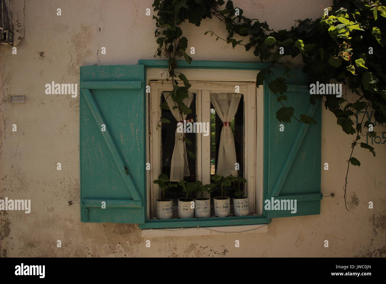 A window in Bozcaada Stock Photo - Alamy