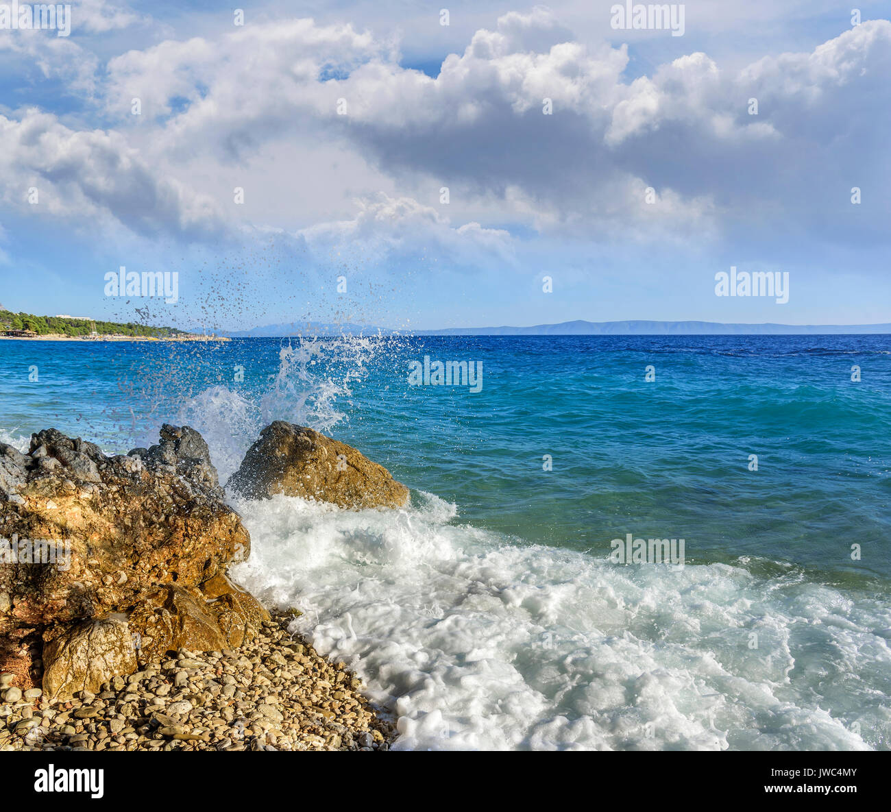 Sea beach. Sea waves crashing against the rocks on the coast Stock ...