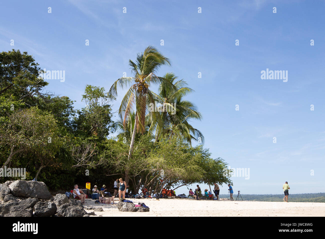 Visitors to Isla Granito de Oro,meaning Little Grain of Gold,sunbathe,relax and photograph on the small island. Stock Photo