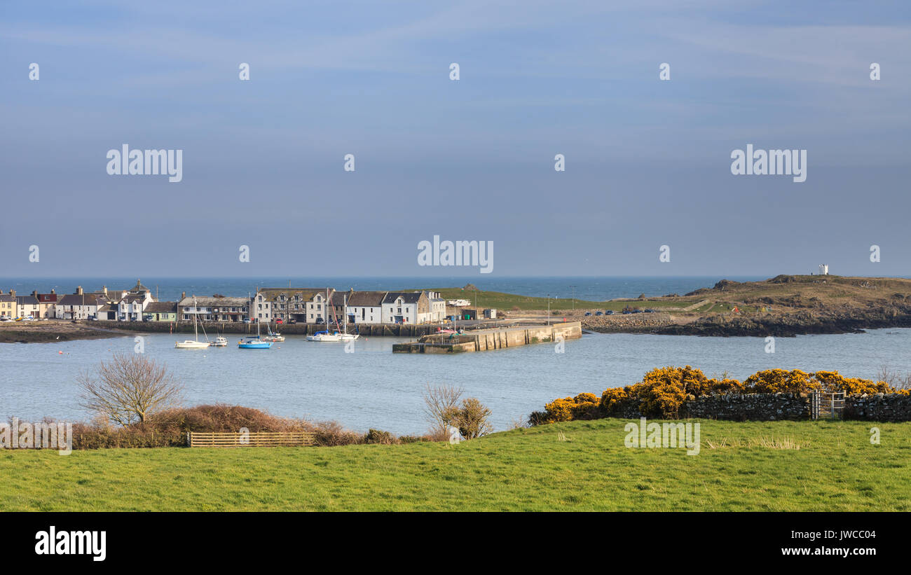 The view across Isle of Whithorn Bay to the small coastal village of