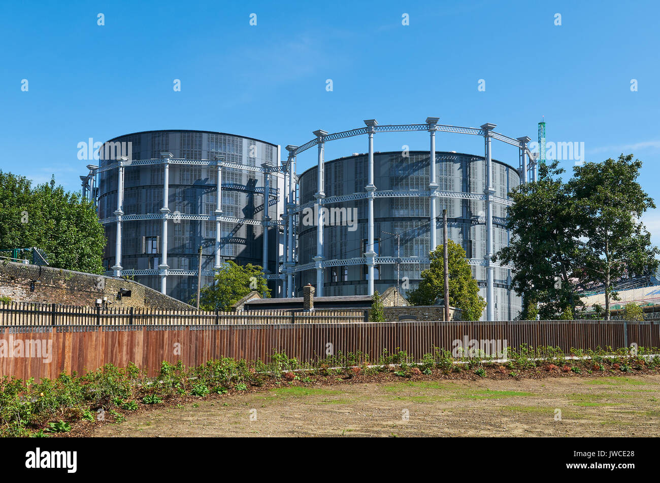 New apartments in converted gasworks at Gasholder Park, at King's Cross, North London UK Stock Photo