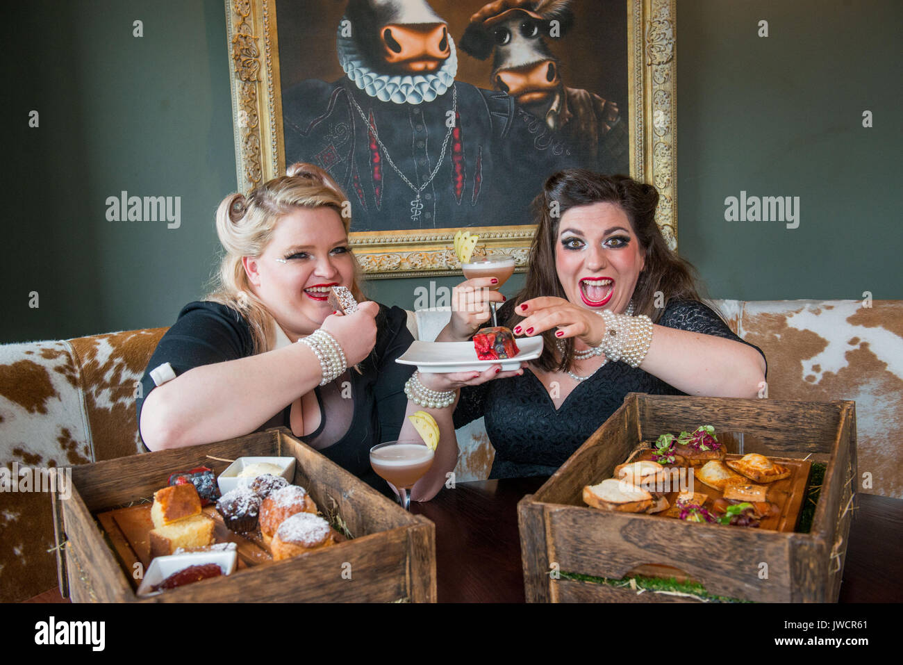 Kyloe launches National Afternoon Tea Week with Gilded Balloon act, 'Mothers Ruin: A Cabaret About Gin’, savouring Kyloe's take on the traditional. Stock Photo