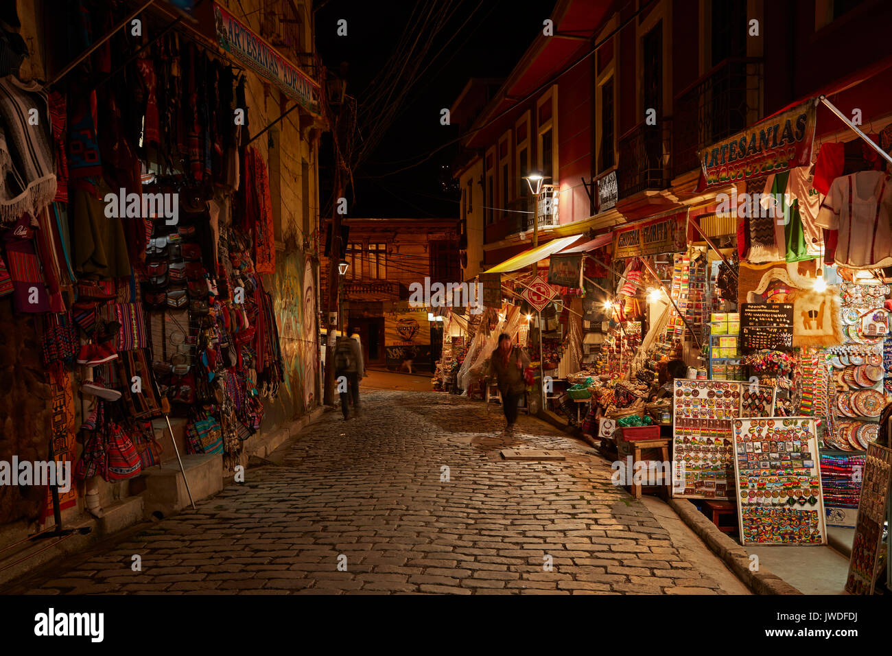 Shops selling Bolivian handicrafts along Linares at night, Witches Market, La Paz, Bolivia, South America Stock Photo