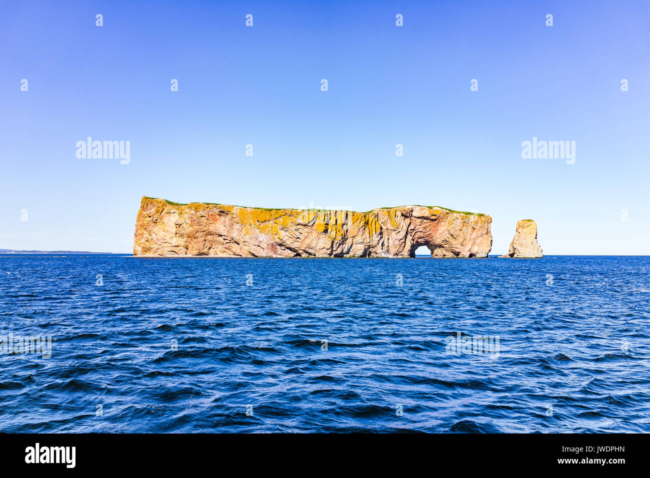Rocher Perce rock in Gaspe Peninsula, Quebec, Gaspesie region with dark
